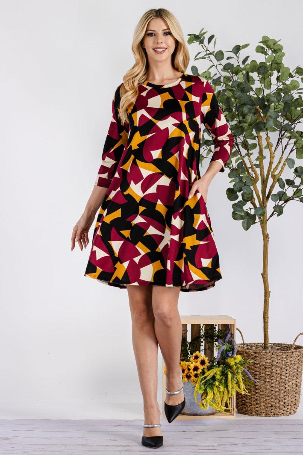Celeste Full Size Geometric Round Neck Dress with Pockets - ClubOn