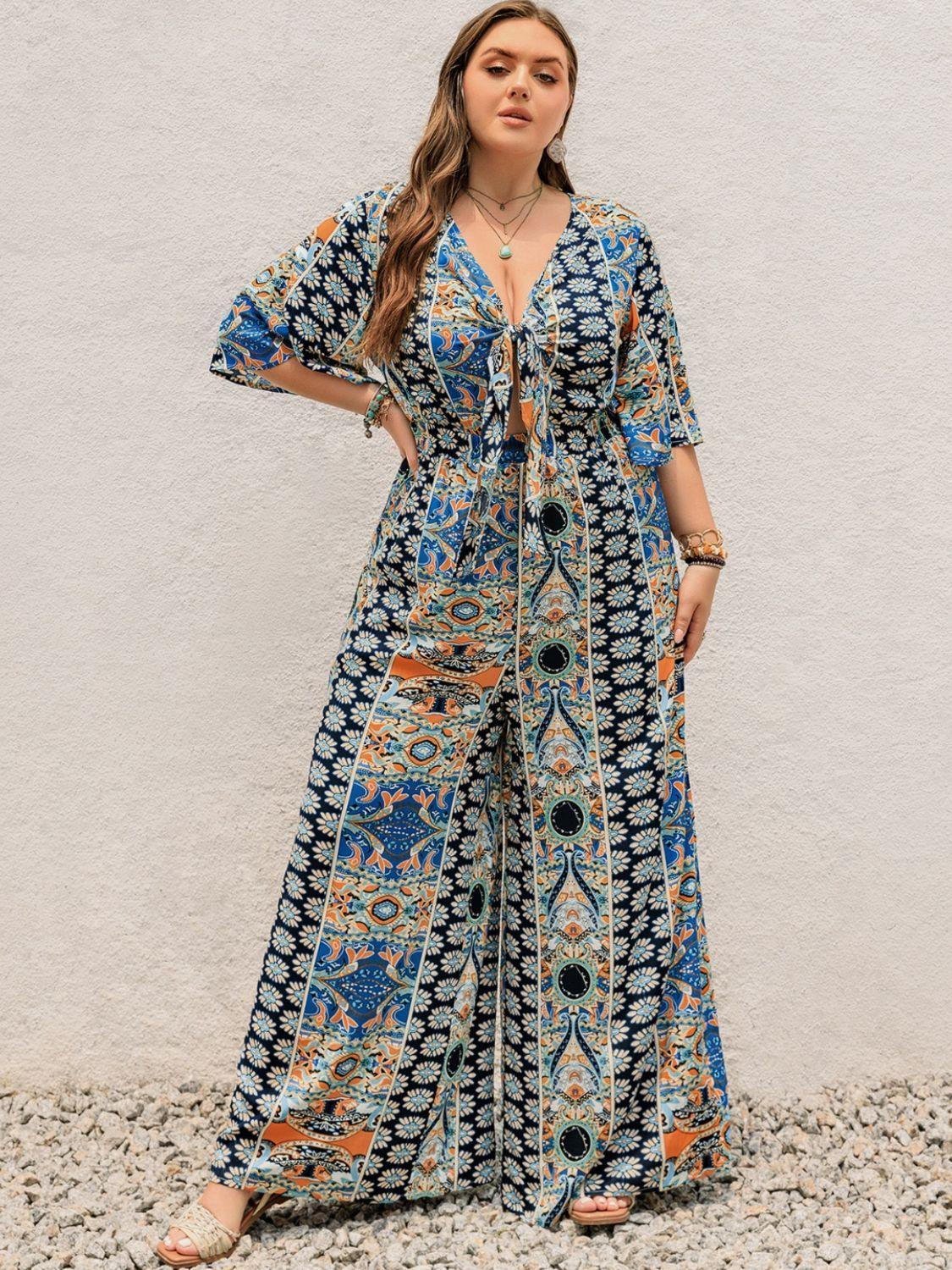 Plus Size Printed Half Sleeve Wide Leg Jumpsuit - ClubOn