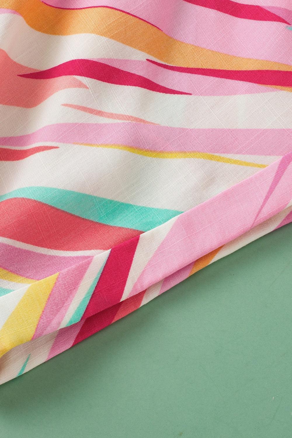 Plus Size Printed Notched Short Sleeve Blouse - ClubOn