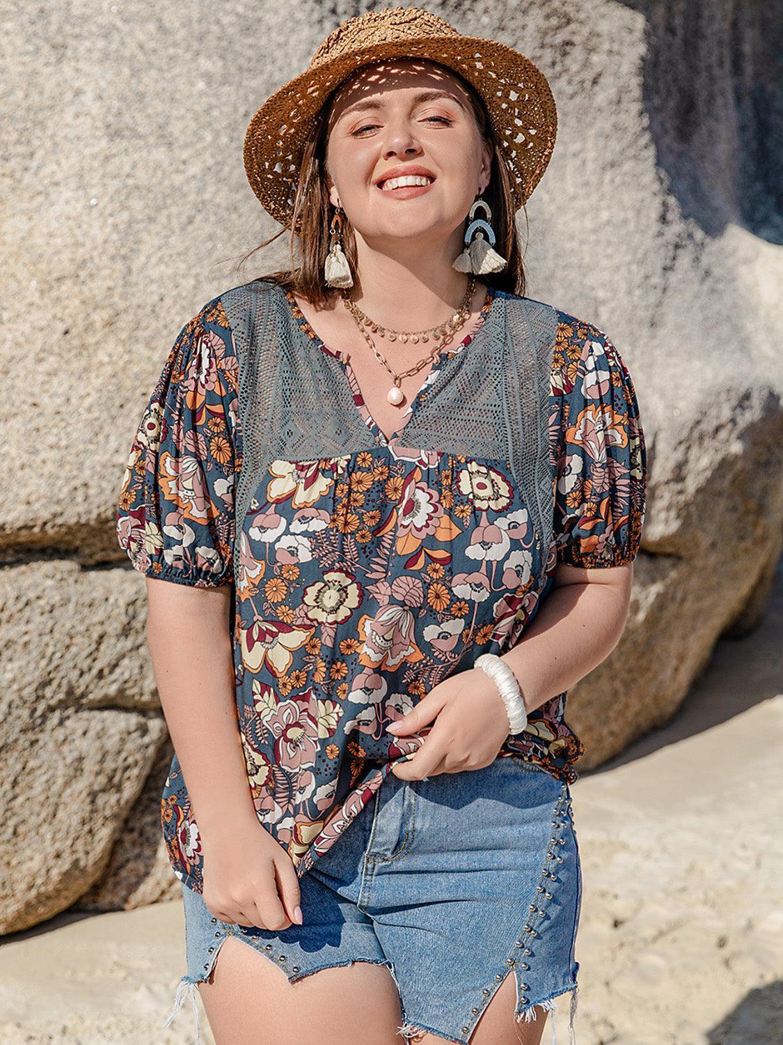Plus Size Printed Notched Half Sleeve Blouse - ClubOn