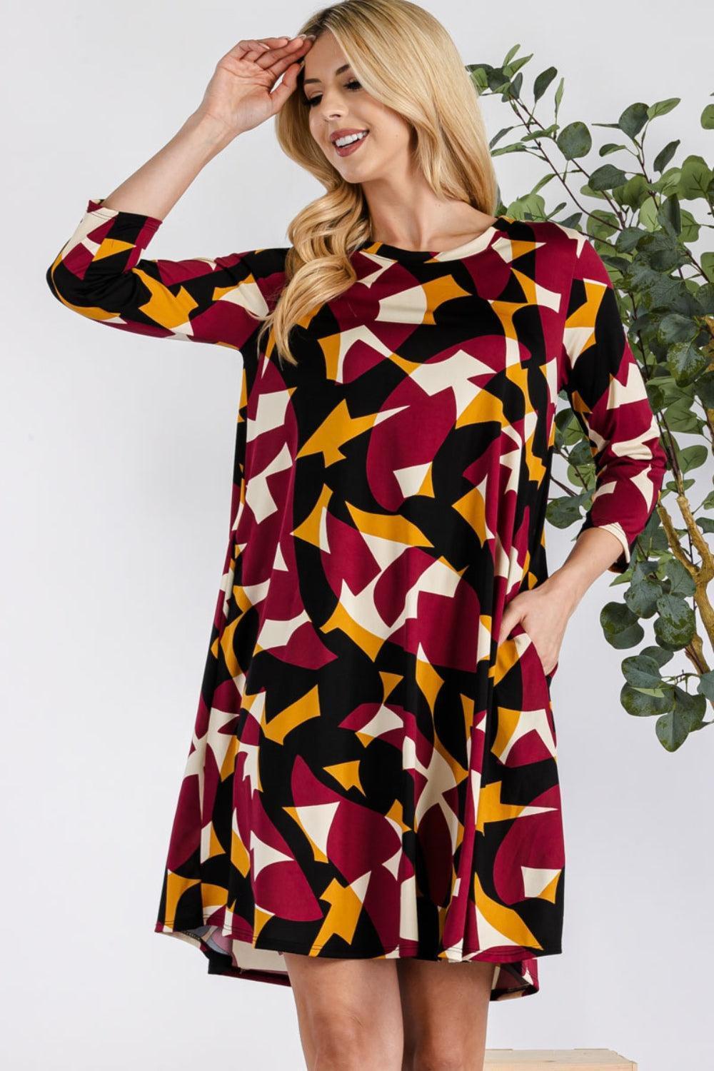 Celeste Full Size Geometric Round Neck Dress with Pockets - ClubOn