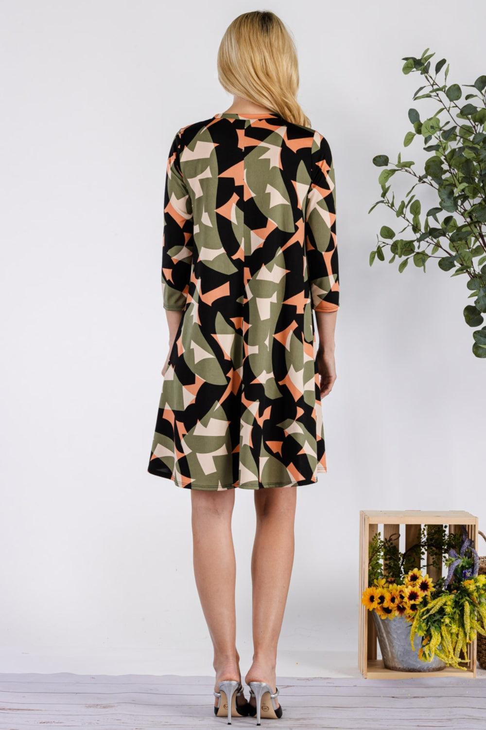 Celeste Full Size Geometric Round Neck Dress with Pockets - ClubOn