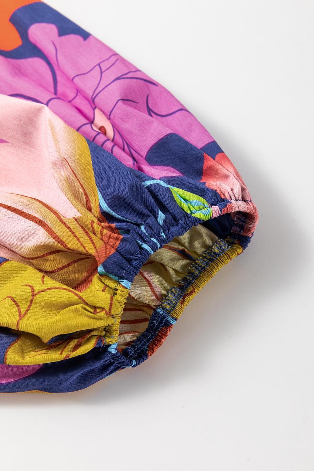 Plus Size Printed Tie Neck Long Sleeve Dress - ClubOn