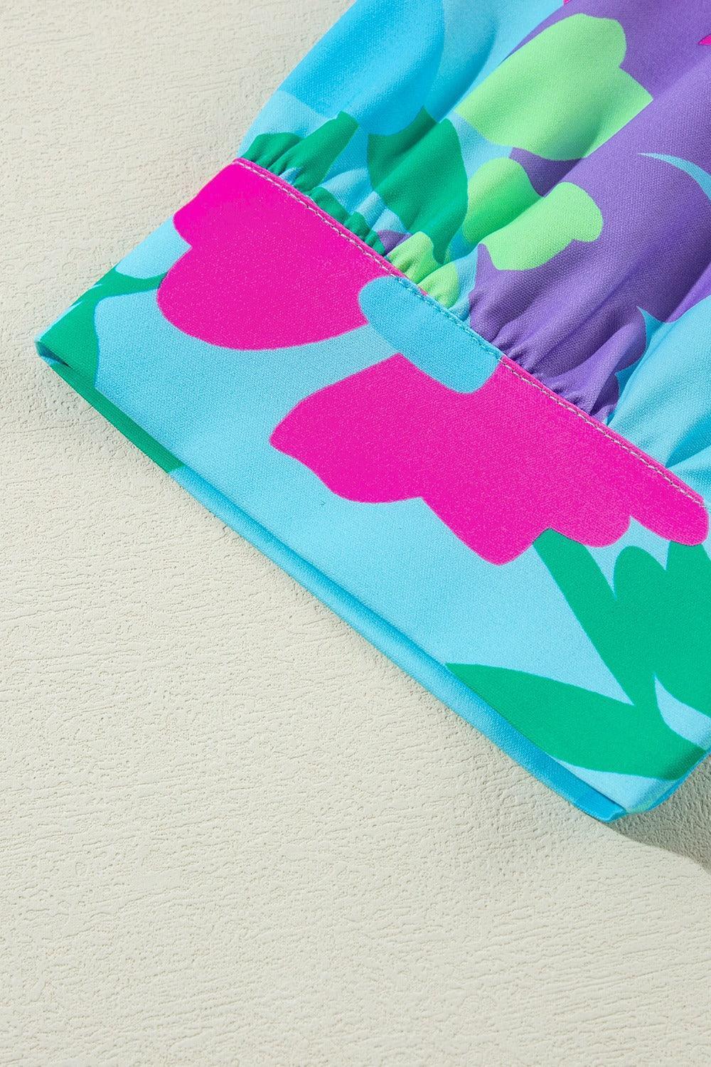 Plus Size Peplum Printed Notched Blouse - ClubOn