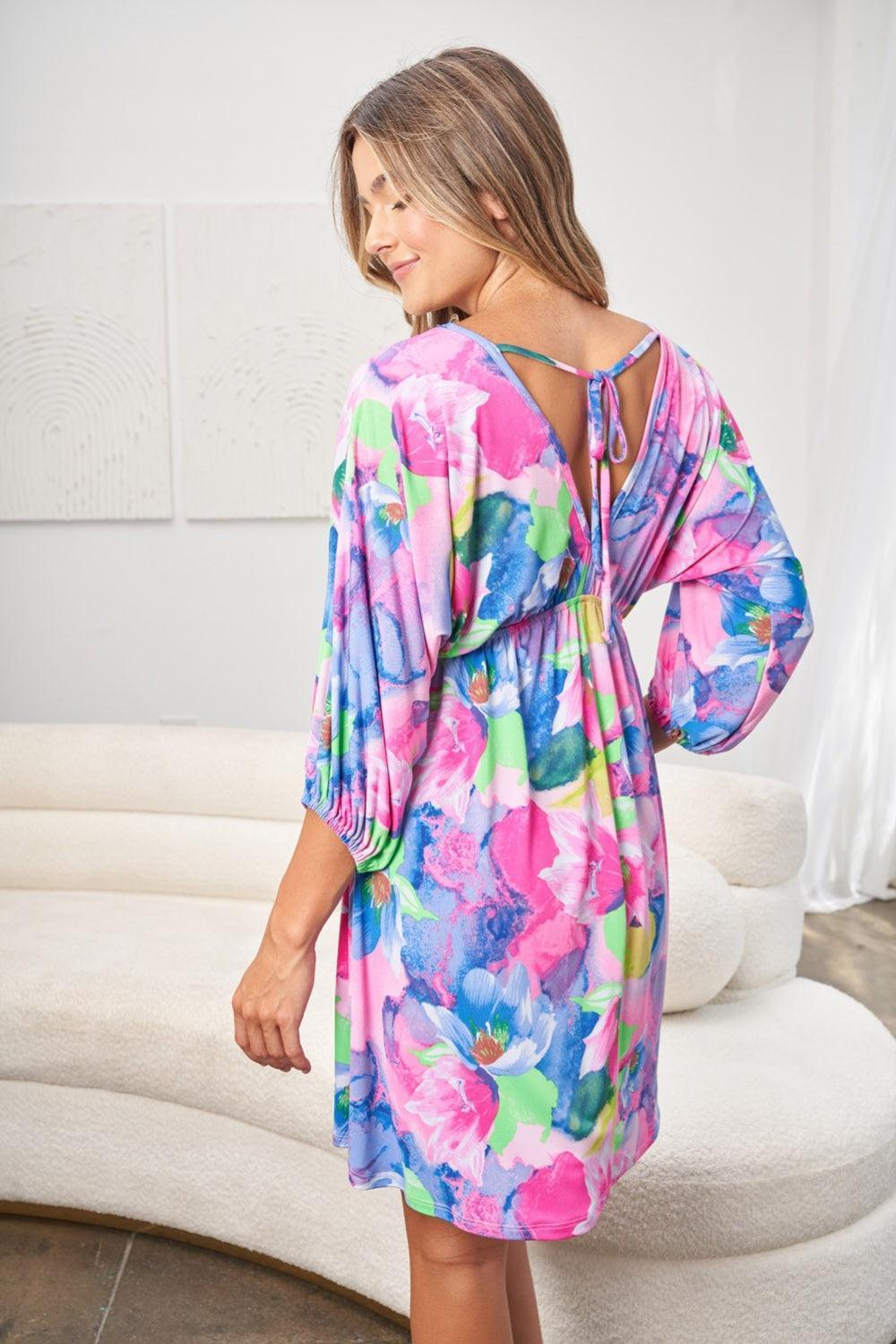 White Birch Full Size Printed V-Neck Tie Back Mini Dress - ClubOn