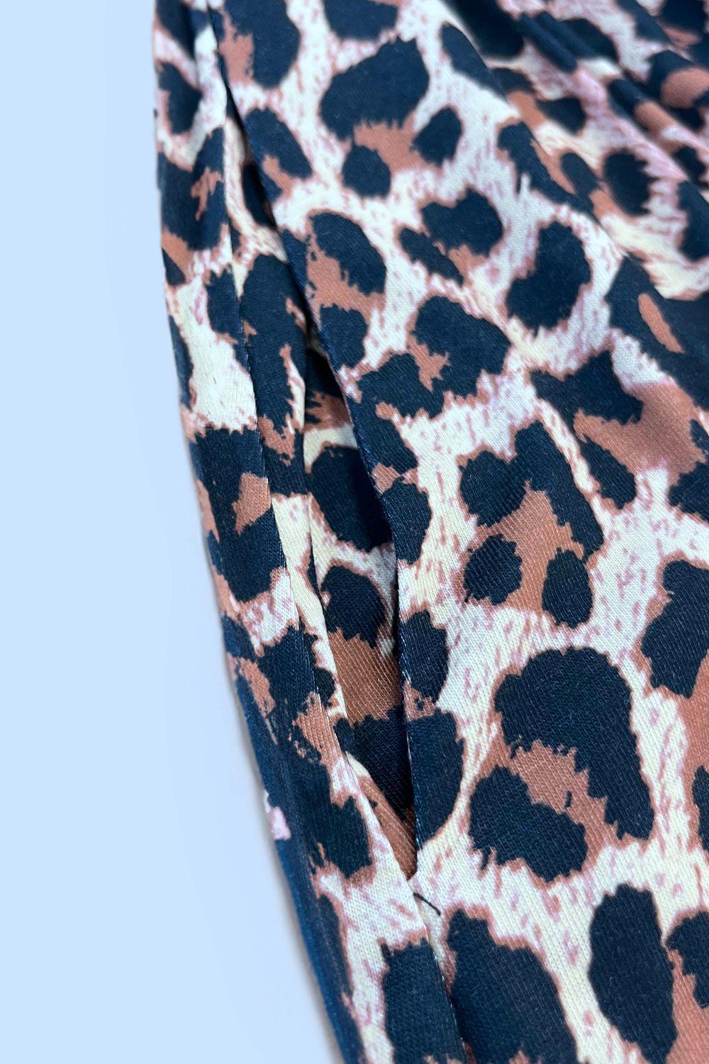 Double Take Printed Scoop Neck Sleeveless Buttoned Magic Dress with Pockets - ClubOn