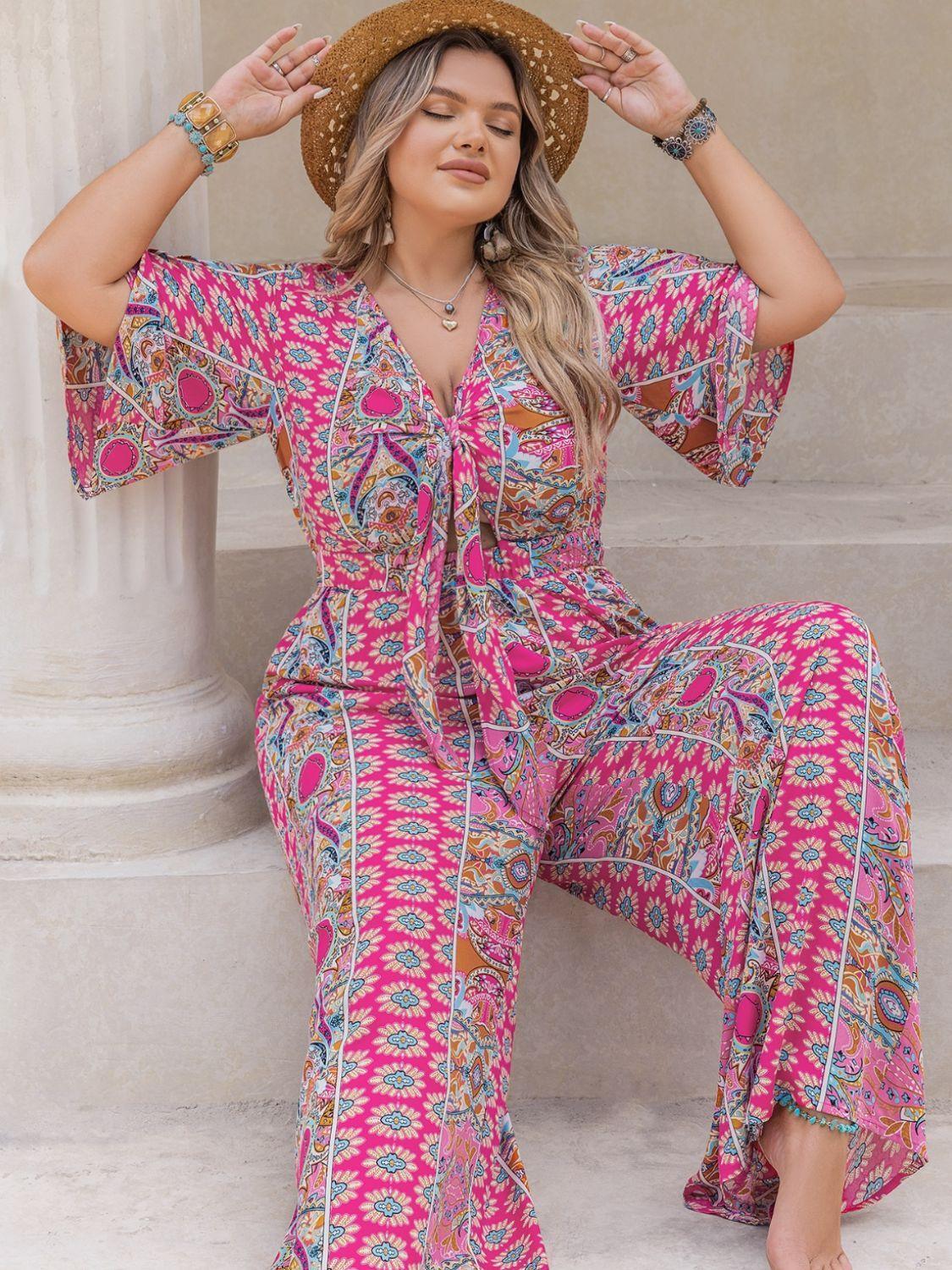Plus Size Printed Half Sleeve Wide Leg Jumpsuit - ClubOn