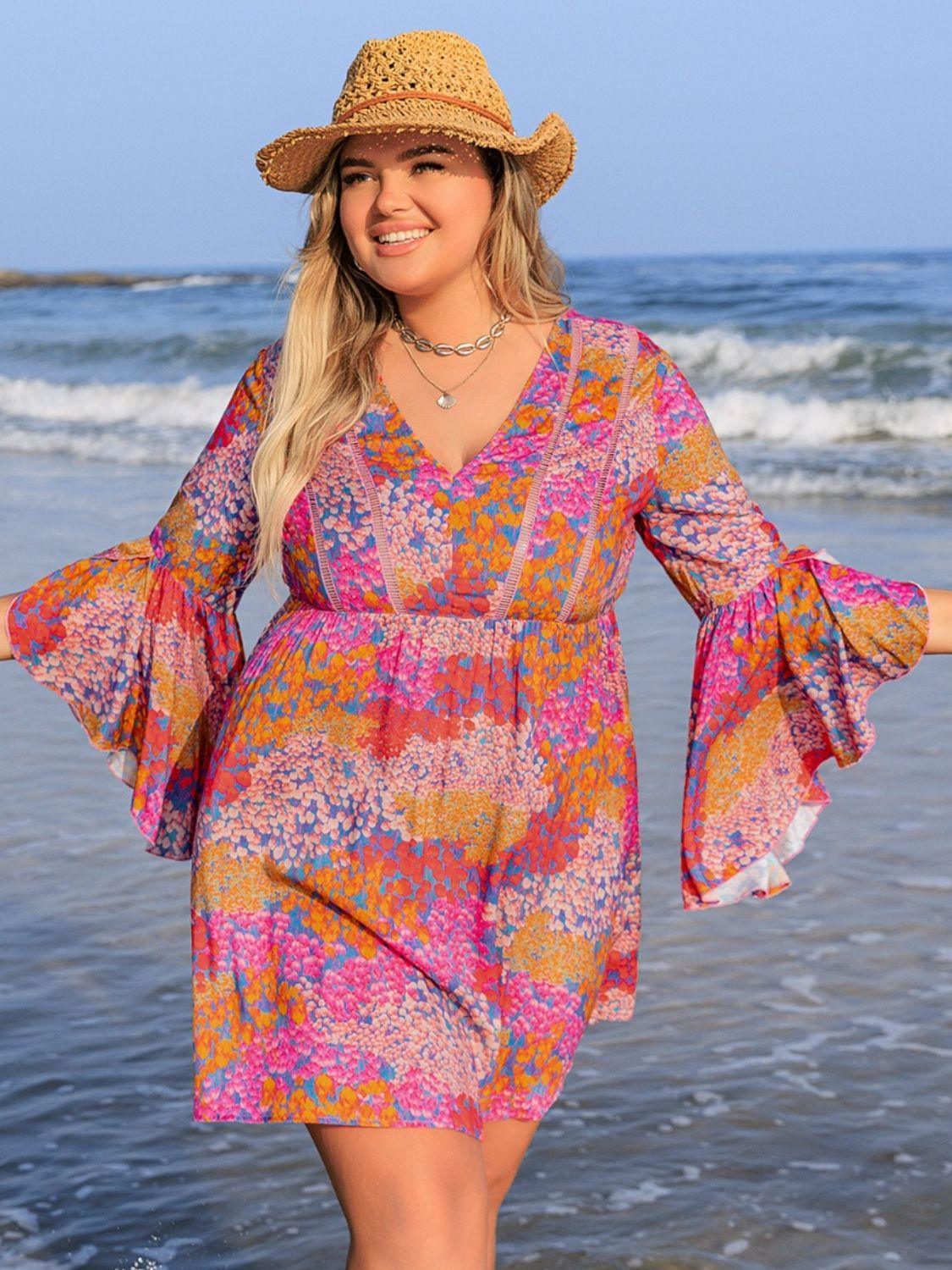 Plus Size Ruched Printed Long Sleeve Dress - ClubOn
