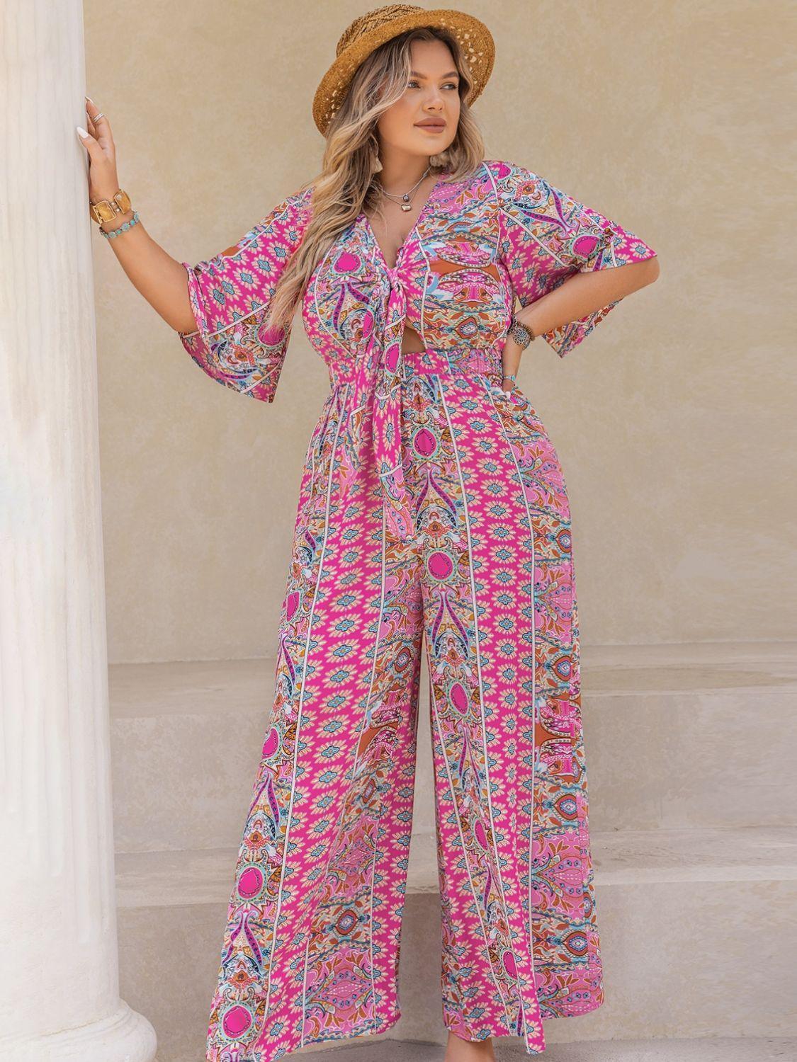 Plus Size Printed Half Sleeve Wide Leg Jumpsuit - ClubOn