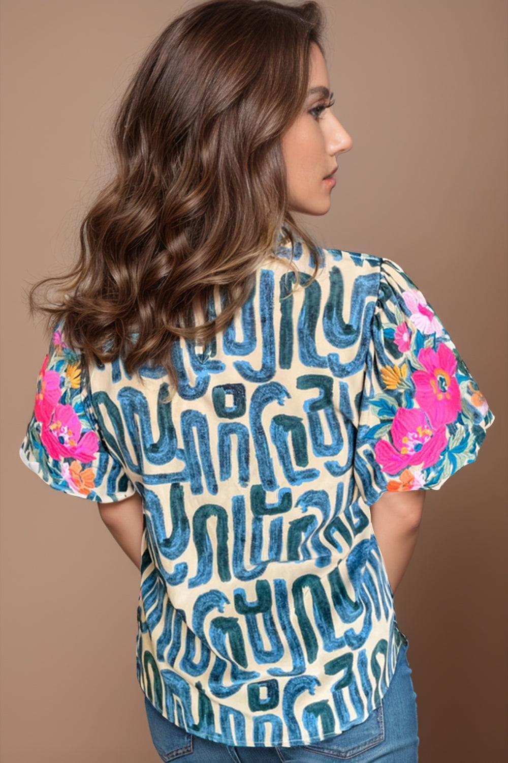Plus Size Printed Mock Neck Short Sleeve Blouse - ClubOn