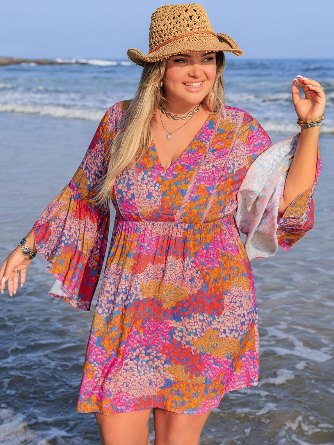 Plus Size Ruched Printed Long Sleeve Dress - ClubOn