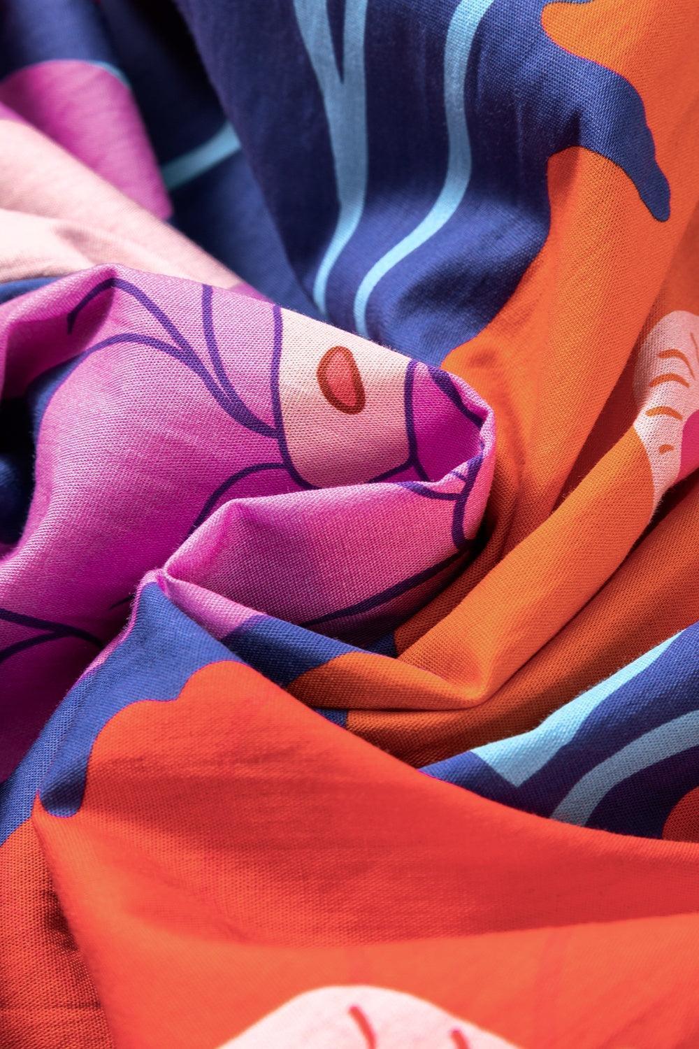 Plus Size Printed Tie Neck Long Sleeve Dress - ClubOn