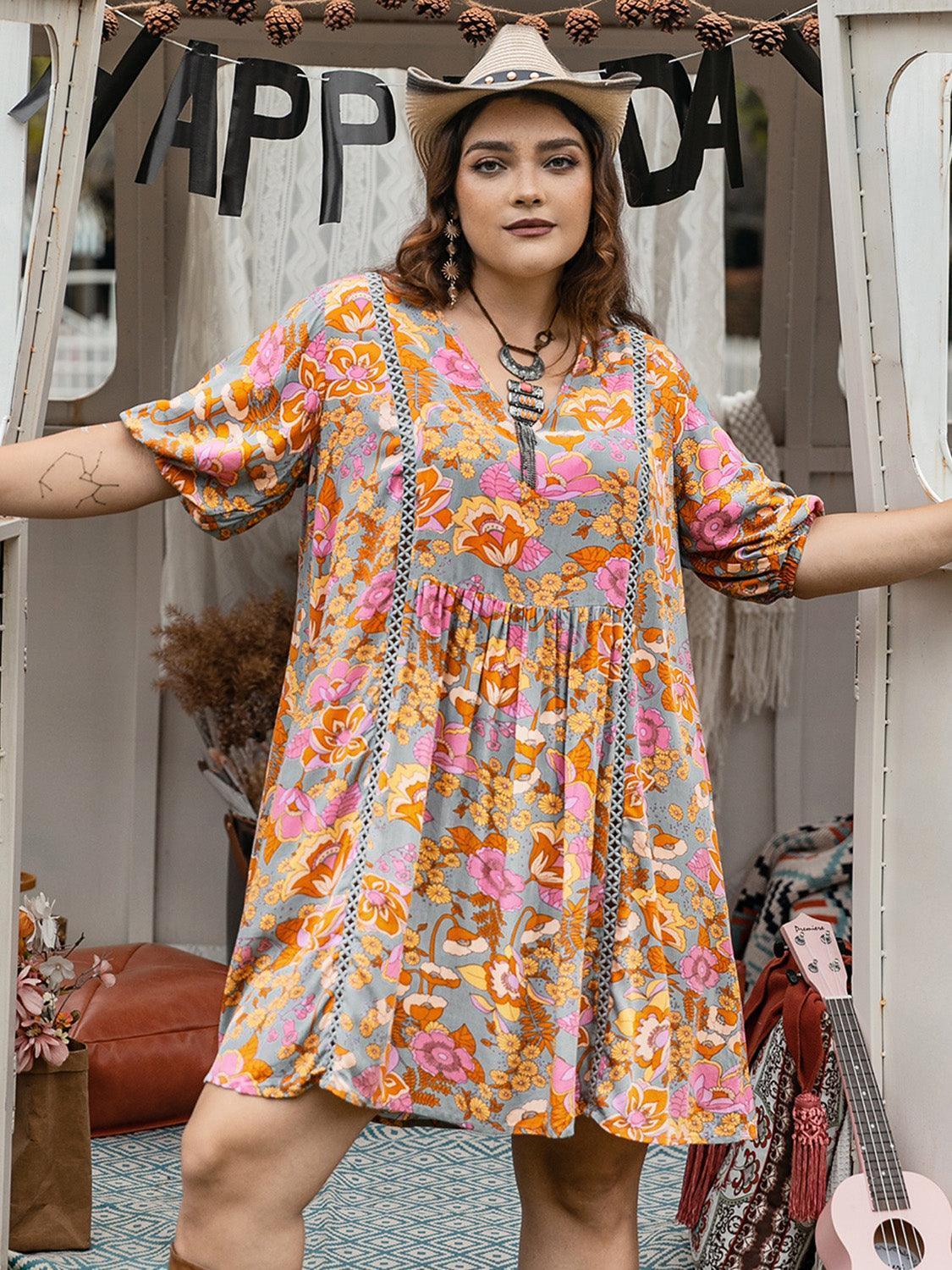 Plus Size Ruched Printed Half Sleeve Mini Dress - ClubOn