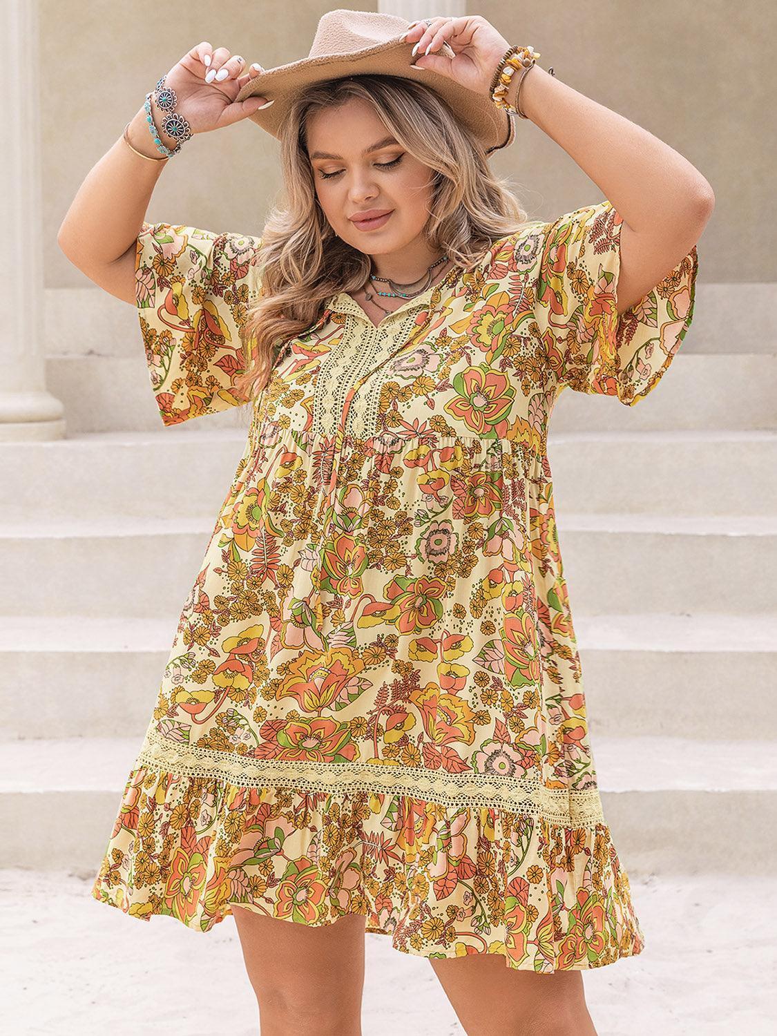 Plus Size Printed Tie Neck Short Sleeve Mini Dress - ClubOn