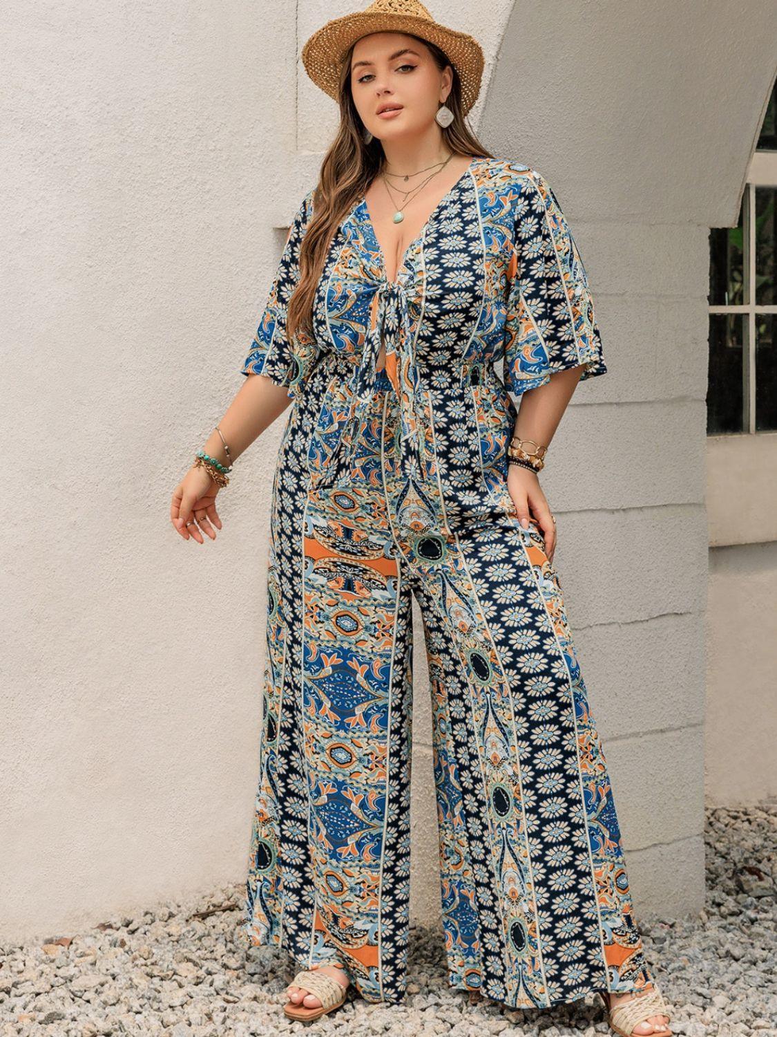 Plus Size Printed Half Sleeve Wide Leg Jumpsuit - ClubOn