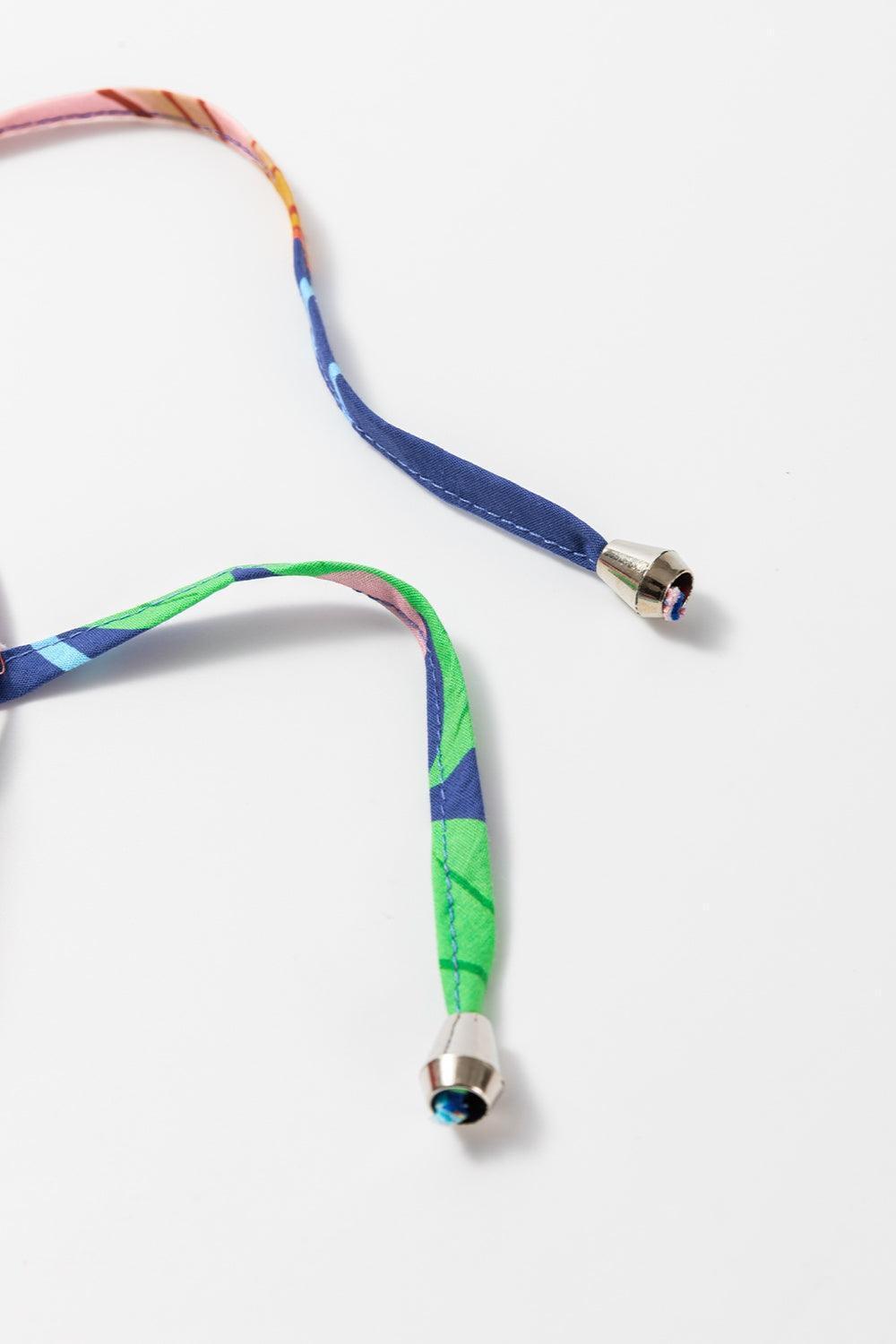 Plus Size Printed Tie Neck Long Sleeve Dress - ClubOn