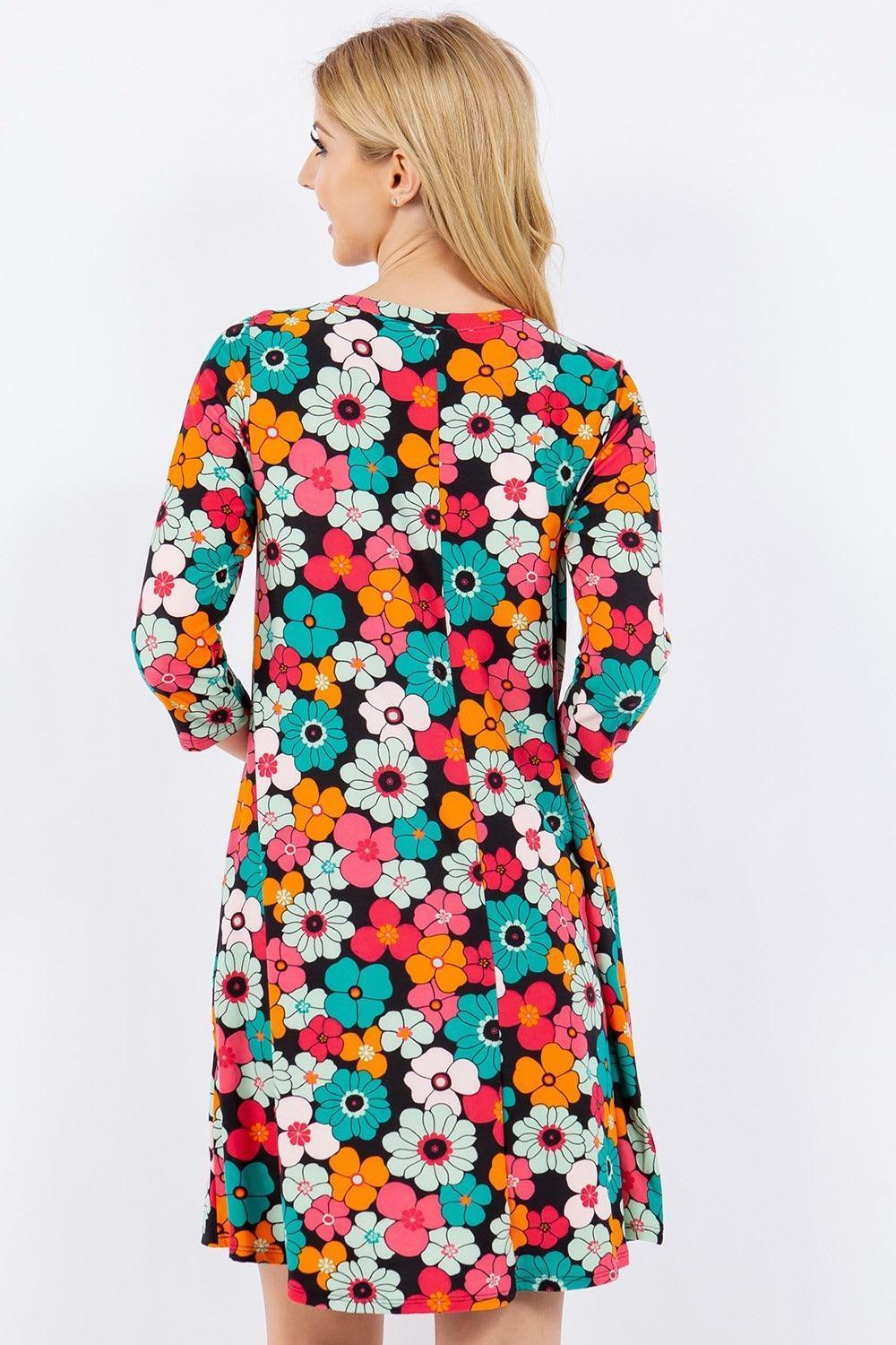 Celeste Full Size Floral Three-Quarter Sleeve Dress with Pockets - ClubOn