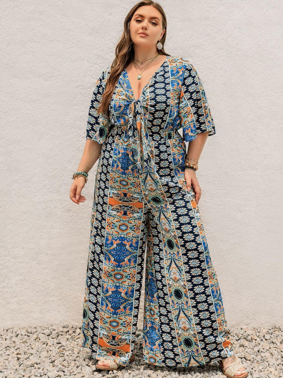 Plus Size Printed Half Sleeve Wide Leg Jumpsuit - ClubOn
