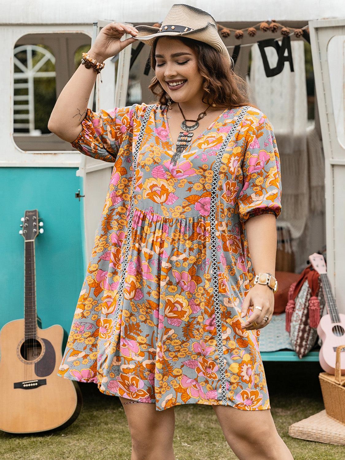 Plus Size Ruched Printed Half Sleeve Mini Dress - ClubOn