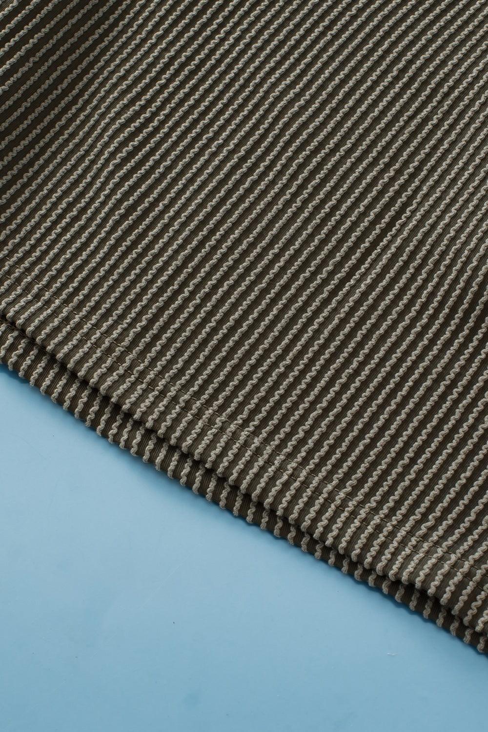 Plus Size Round Neck Top and Pocketed Shorts Set - ClubOn