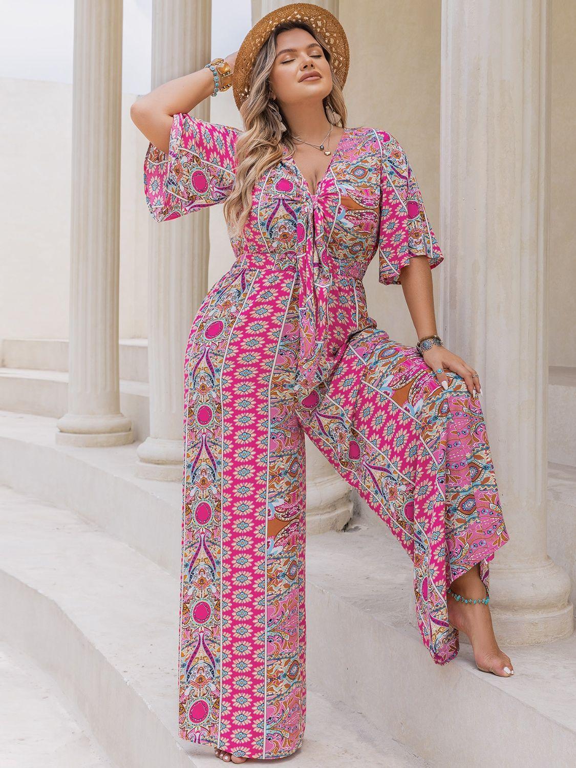 Plus Size Printed Half Sleeve Wide Leg Jumpsuit - ClubOn