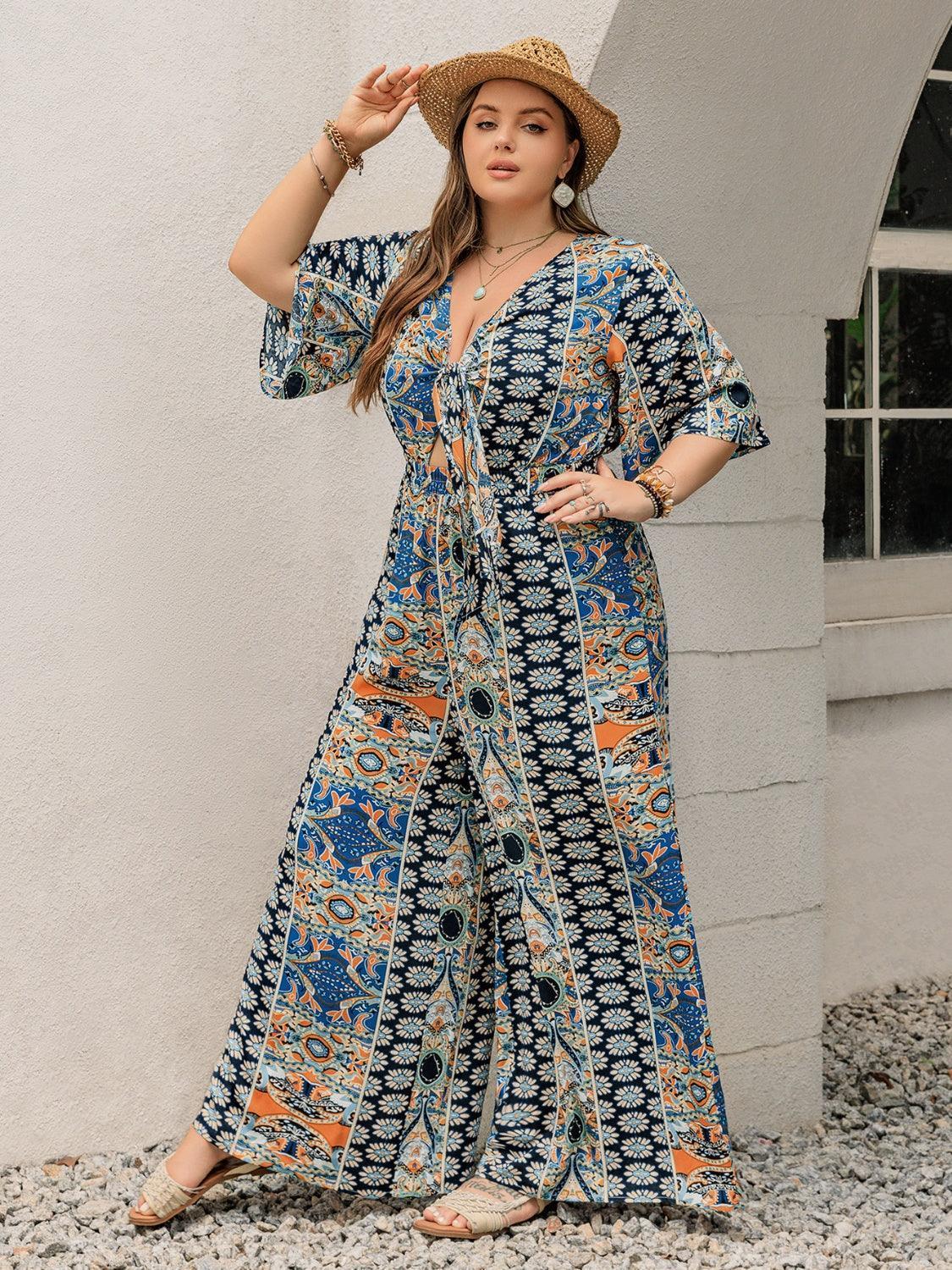 Plus Size Printed Half Sleeve Wide Leg Jumpsuit - ClubOn