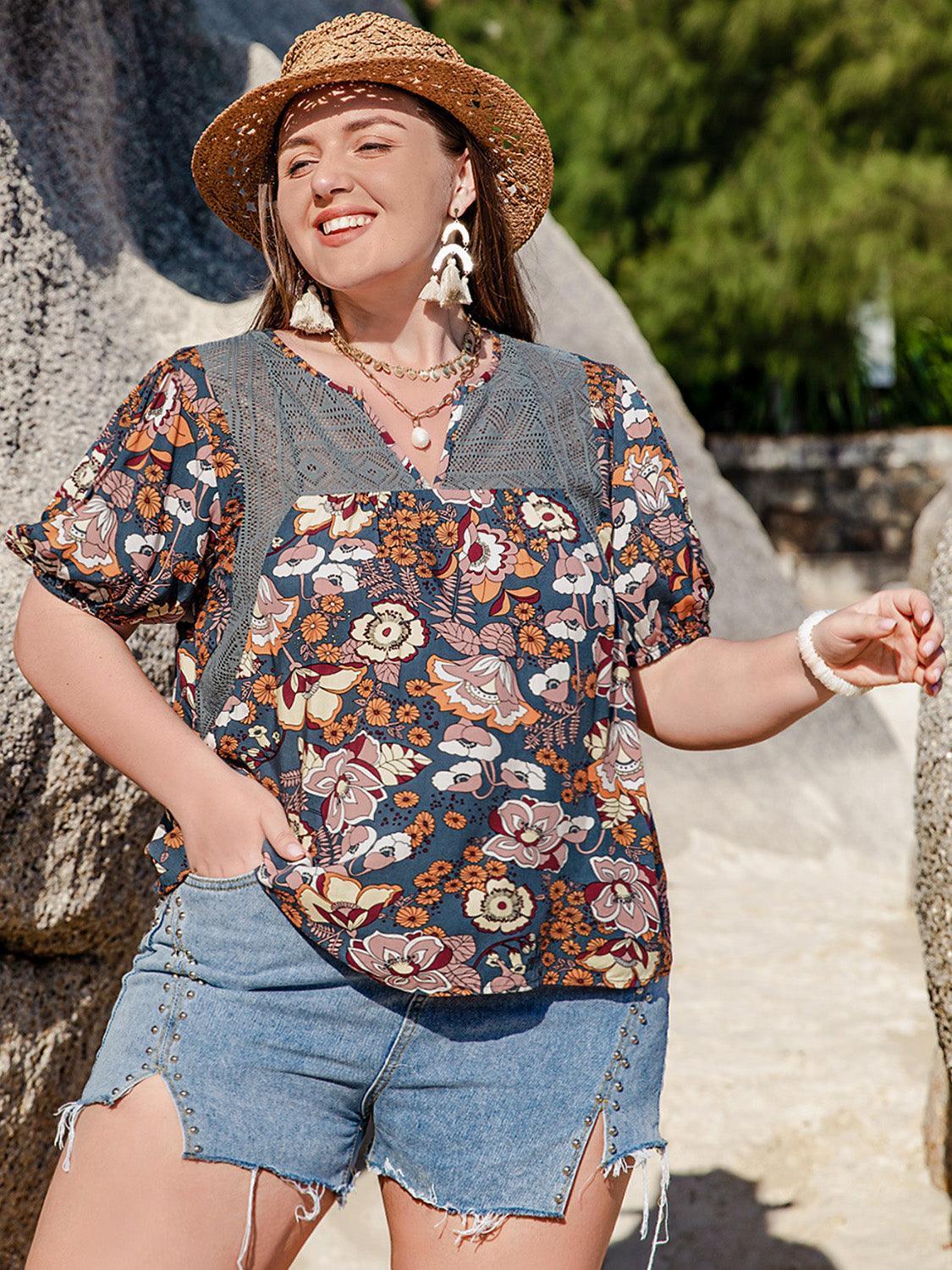 Plus Size Printed Notched Half Sleeve Blouse - ClubOn